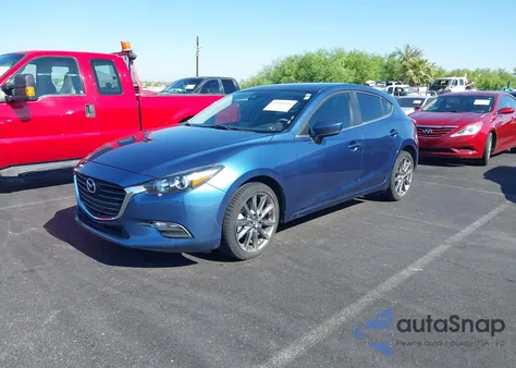 2018 Mazda Mazda3 Touring from USA, damaged, VIN 3MZBN1L34JM269653